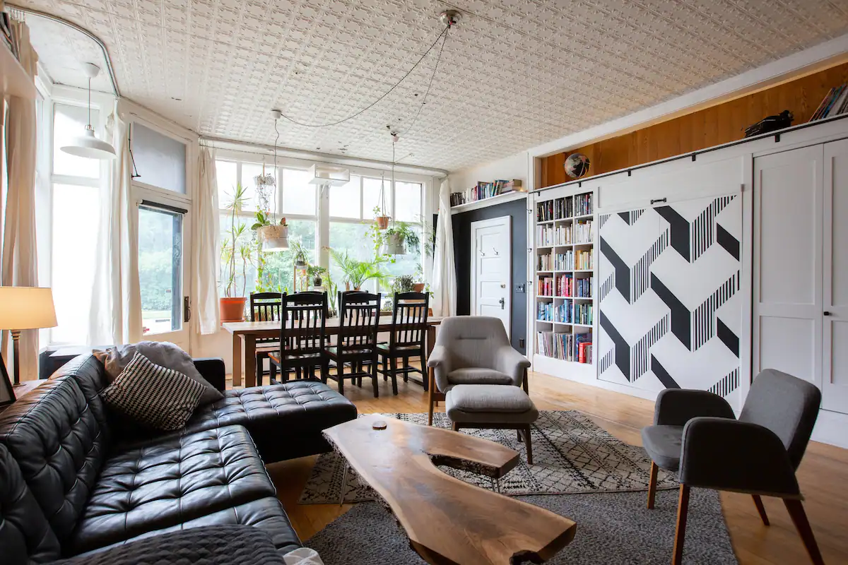 The Storefront — original tin ceiling and open living space